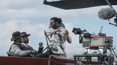 This image released by Warner Bros. Pictures shows actors Delroy Lindo, from left, and Michael B. Jordan with director-writer-producer Ryan Coogler on the set of Sinners. (Eli Adé/Warner Bros. Pictures via AP) (AP) This image released by Warner Bros. Pictures shows actors Delroy Lindo, from left, and Michael B. Jordan with director-writer-producer Ryan Coogler on the set of Sinners. (Eli Adé/Warner Bros. Pictures via AP) (AP)