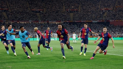 FC Barcelona's Jules Kounde celebrates scoring their third goal with teammates (REUTERS)