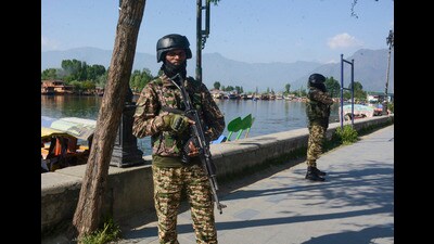Security personnel keep a vigil on the banks of Dal Lake, in the aftermath of the Pahalgam terrorist attack, in Srinagar, on Sunday. (PTI)