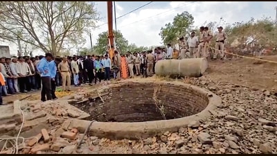 Soon after the accident, villagers began rescue operations by throwing ropes into the well. (PTI) Soon after the accident, villagers began rescue operations by throwing ropes into the well. (PTI)