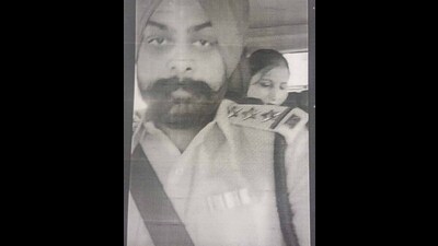 Video grab of Karanbir Singh wearing a police uniform. (HT Photo) Video grab of Karanbir Singh wearing a police uniform. (HT Photo)
