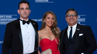 From left; Fox News journalist Trey Yingst, Senior Vice President of BAY Public Relations Sarah March and CBS News journalist Fin Gómez pose for photographers as they arrive at the annual White House Correspondents' Association Dinner in Washington, Saturday, April 26, 2025. (AP Photo/Jose Luis Magana) (AP) From left; Fox News journalist Trey Yingst, Senior Vice President of BAY Public Relations Sarah March and CBS News journalist Fin Gómez pose for photographers as they arrive at the annual White House Correspondents' Association Dinner in Washington, Saturday, April 26, 2025. (AP Photo/Jose Luis Magana) (AP)