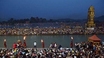 Devotees attend aarti during evening prayers at the Har Ki Pauri ghat along the banks of river Ganges in Haridwar on April 26, 2025. (AFP) Devotees attend aarti during evening prayers at the Har Ki Pauri ghat along the banks of river Ganges in Haridwar on April 26, 2025. (AFP)