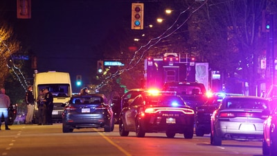 Police officers work at the scene, after a vehicle drove into a crowd at the Lapu Lapu day block party, in which police say multiple people were killed and injured, in Vancouver, Canada April 27. (REUTERS)