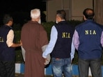National Investigation Agency (NIA) officials along with Tahawwur Hussain Rana. National Investigation Agency (NIA) officials along with Tahawwur Hussain Rana.