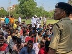 Detained Bangladeshi migrants are pictured at a crime branch office following an overnight operation by the state police in Ahmedabad on April 26, 2025. Detained Bangladeshi migrants are pictured at a crime branch office following an overnight operation by the state police in Ahmedabad on April 26, 2025.