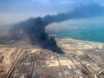 Smoke billows at the site of explosion that took place at the Shahid Rajaee port dock on April 27.