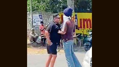A video grab of one of the accused assaulting a trader in Ludhiana on Sunday. (HT) A video grab of one of the accused assaulting a trader in Ludhiana on Sunday. (HT)