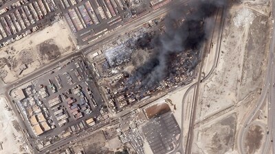 This satellite photo from Planet Labs PBC shows the epicenter of an explosion at the Shahid Rajaei port near Bandar Abbas, Iran, Monday, April 28, 2025. (AP) This satellite photo from Planet Labs PBC shows the epicenter of an explosion at the Shahid Rajaei port near Bandar Abbas, Iran, Monday, April 28, 2025. (AP)