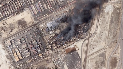 This satellite photo from Planet Labs PBC shows the epicenter of an explosion at the Shahid Rajaei port near Bandar Abbas, Iran, Monday, April 28, 2025. (AP) This satellite photo from Planet Labs PBC shows the epicenter of an explosion at the Shahid Rajaei port near Bandar Abbas, Iran, Monday, April 28, 2025. (AP)