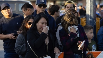 People light candles at a memorial after a vehicle drove into a crowd during a Filipino heritage festival in Vancouver, British Columbia, Sunday, April 27, 2025. (Getty Images via AFP) People light candles at a memorial after a vehicle drove into a crowd during a Filipino heritage festival in Vancouver, British Columbia, Sunday, April 27, 2025. (Getty Images via AFP)