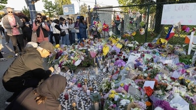 VANCOUVER, BRITISH COLUMBIA - APRIL 27: People attend the candlelight vigil near the scene where a car drove into a crowd of people during the Lapu Lapu Festival on April 27, 2025 in Vancouver, Canada. (Photo by Andrew Chin / GETTY IMAGES NORTH AMERICA / Getty Images via AFP) (Getty Images via AFP) VANCOUVER, BRITISH COLUMBIA - APRIL 27: People attend the candlelight vigil near the scene where a car drove into a crowd of people during the Lapu Lapu Festival on April 27, 2025 in Vancouver, Canada. (Photo by Andrew Chin / GETTY IMAGES NORTH AMERICA / Getty Images via AFP) (Getty Images via AFP)