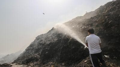 Fire officials continue to douse the fire, a day after it started at a waste treatment plant near Bandhwari. (Parveen Kumar/HT Photo) Fire officials continue to douse the fire, a day after it started at a waste treatment plant near Bandhwari. (Parveen Kumar/HT Photo)
