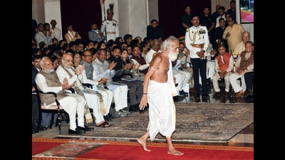 Ganeshwar Shastri Dravid moves forward to receive Padma Shri for his contribution in the field of Literature and Education during Civil Investiture Ceremony-I, at Rashtrapati Bhavan, in New Delhi on Monday. (ANI) Ganeshwar Shastri Dravid moves forward to receive Padma Shri for his contribution in the field of Literature and Education during Civil Investiture Ceremony-I, at Rashtrapati Bhavan, in New Delhi on Monday. (ANI)