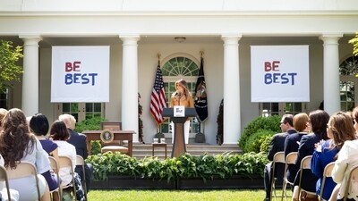 Melania Trump is seen at the “Be Best” initiative, which aims to help children with their well-being and online safety. FLOTUS wore a white skirt and a tan leather jacket for the occasion. Melania Trump is seen at the “Be Best” initiative, which aims to help children with their well-being and online safety. FLOTUS wore a white skirt and a tan leather jacket for the occasion. 