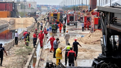Iranian Red Crescent rescuers work following an explosion at the Shahid Rajaee port in Bandar Abbas, Iran, April 27, 2025. &nbsp;The incident occurred as Iran began a third round of nuclear talks with the United States in Oman, but there was no indication of a link between the two events.&nbsp; (Reuters)