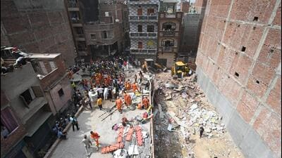 In the early hours of April 19, a residential building with more than 25 occupants collapsed in Dayalpur village in northeast Delhi. (Sanchit Khanna/HT Photo) In the early hours of April 19, a residential building with more than 25 occupants collapsed in Dayalpur village in northeast Delhi. (Sanchit Khanna/HT Photo)