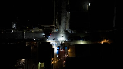 A drone view shows cars driving through a dark street after Puerto Rico was hit with a massive power outage where energy plants across the island unexpectedly shut down, in San Juan, Puerto Rico April 16, 2025.  REUTERS/Ricardo Arduengo (REUTERS)