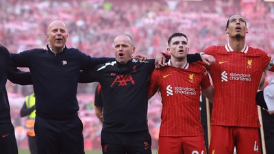 Liverpool manager Arne Slot, Andrew Robertson and Virgil van Dijk celebrate after winning the Premier League. (REUTERS)