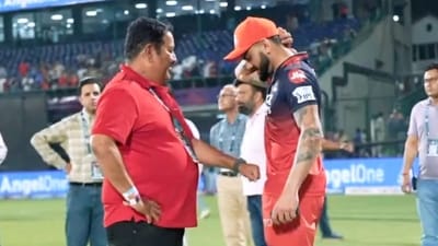 Rajkumar Sharma (L) and Virat Kohli at the Arjun Jaitley Stadium (Screengrab) Rajkumar Sharma (L) and Virat Kohli at the Arjun Jaitley Stadium (Screengrab)