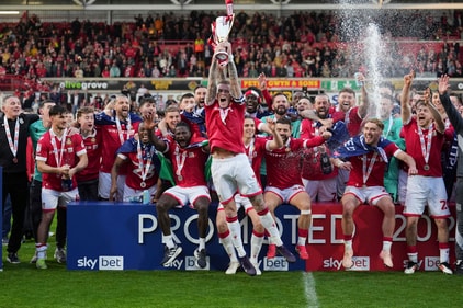 Wrexham's James McClean rises the trophy as they win the English League One soccer match between Wrexham and Charlton Athletic at the Racecourse ground in Wrexham, Wales, Saturday, April 26, 2025. (AP Photo/Jon Super) (AP) Wrexham's James McClean rises the trophy as they win the English League One soccer match between Wrexham and Charlton Athletic at the Racecourse ground in Wrexham, Wales, Saturday, April 26, 2025. (AP Photo/Jon Super) (AP)