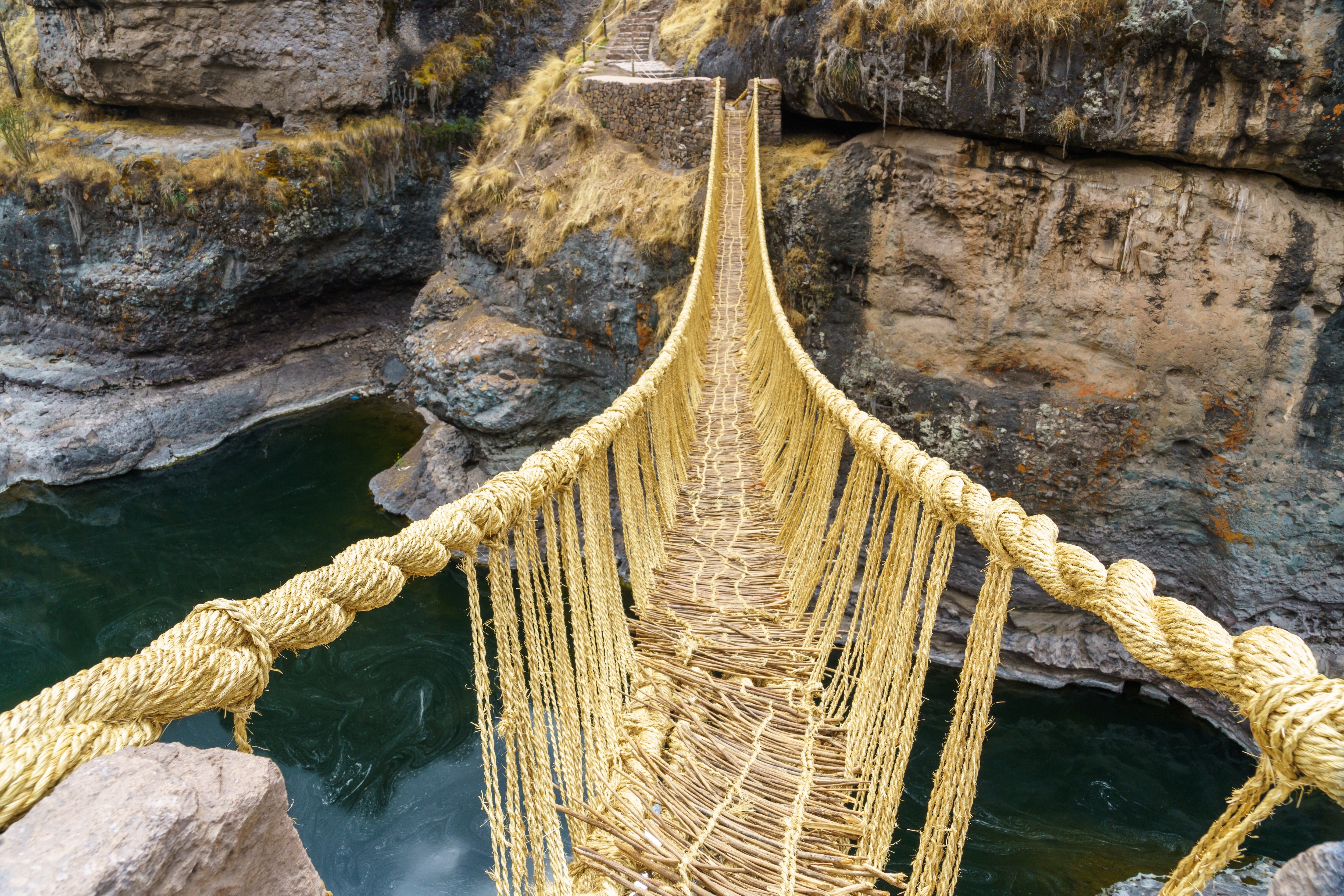The Queshuachaca, the last remaining Inca rope bridge, consisting of grass ropes that span the Apurímac River near Huinchiri in Peru. (Shutterstock)