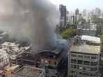 A civic official said the fire broke in the building’s basement but later spread to the upper floors, which were soon filled with smoke.