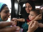 A Pakistani citizen (C) bids goodbye to her son, an Indian citizen, as she prepares to return to her country through the India-Pakistan Wagah border post, about 35 km from Amritsar on April 29, 2025. A Pakistani citizen (C) bids goodbye to her son, an Indian citizen, as she prepares to return to her country through the India-Pakistan Wagah border post, about 35 km from Amritsar on April 29, 2025.