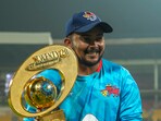 Prithvi Shaw poses for photographs with the championship trophy after winning the T20 cricket final match of the Syed Mushtaq Ali Trophy. (PTI Photo/Shailendra Bhojak) (PTI12_15_2024_000327B)