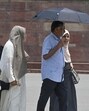 People brave the heat on a hot summer afternoon at Red Fort Area on Tuesday. (RAJ K RAJ /HT PHOTO) People brave the heat on a hot summer afternoon at Red Fort Area on Tuesday. (RAJ K RAJ /HT PHOTO)