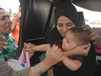 Before crossing over the border at Attari-Wagah border check post, a Pakistan woman (R) bids a teary goodbye to her baby, an Indian citizen, after she was not allowed to accompany her following curbs imposed at the border in wake of Pahalgam terror attack.