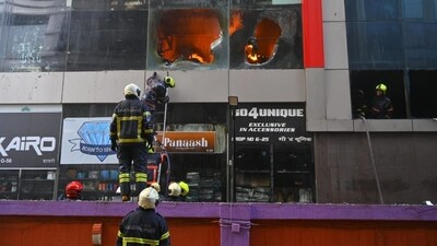 A large fire broke out early Tuesday in a building with an electronics showroom in Mumbai's Bandra. (Satish Bate/ Hindustan Times) A large fire broke out early Tuesday in a building with an electronics showroom in Mumbai's Bandra. (Satish Bate/ Hindustan Times)