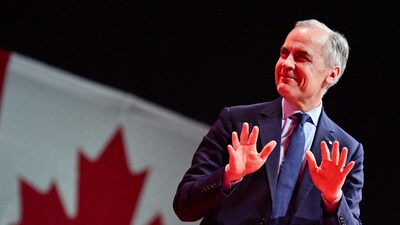 Mark Carney vowed that he would confront Donald Trump with positive energy as US tariffs on Canada continue to be an issue. (REUTERS)