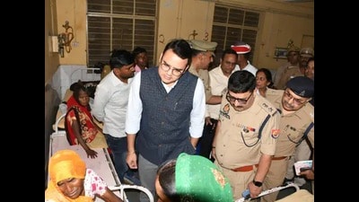 DM Avanish Rai and SSP Brijesh Singh met the injured at the district hospital on Tuesday, and assured of time bound action. (HT Photo) DM Avanish Rai and SSP Brijesh Singh met the injured at the district hospital on Tuesday, and assured of time bound action. (HT Photo)