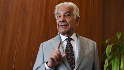 Pakistan’s defence minister Khawaja Muhammad Asif gestures on the day of an interview with Reuters in Islamabad, (REUTERS)