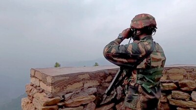 An Army soldier, deployed on LoC, guards after firing on a patrolling team, in Rajouri. (PTI FILE ) An Army soldier, deployed on LoC, guards after firing on a patrolling team, in Rajouri. (PTI FILE )
