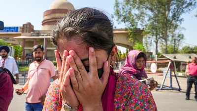 Sarita, a Pakistani national, cries after she is separated from her mother, who is an Indian citizen. The family had arrived at the Integrated Check Post at Attari-Wagah border to move to Pakistan, near Amritsar, on Sunday, April 27, 2025. (PTI) Sarita, a Pakistani national, cries after she is separated from her mother, who is an Indian citizen. The family had arrived at the Integrated Check Post at Attari-Wagah border to move to Pakistan, near Amritsar, on Sunday, April 27, 2025. (PTI)