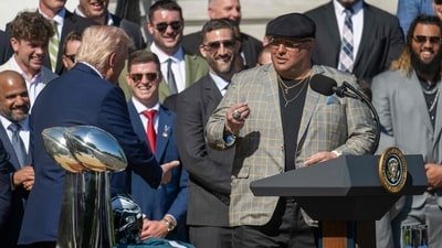 The head of security for the Philadelphia Eagles Dom DiSandro, also known as "Big Dom", (R) gestures toward US President Donald Trump (L) as he speaks during an event celebrating the Philadelphia Eagles, 2025 Super Bowl champions, at the White House. (AFP) The head of security for the Philadelphia Eagles Dom DiSandro, also known as "Big Dom", (R) gestures toward US President Donald Trump (L) as he speaks during an event celebrating the Philadelphia Eagles, 2025 Super Bowl champions, at the White House. (AFP)