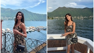 Ananya wore a mini dress during her Italian vacation to enjoy the Riviera. It features a silver foil pattern done in floral embroidery and check patterns. The spaghetti straps, plunging neckline, figure-hugging silhouette, and mini hem length add a feminine touch to her look. Ananya wore a mini dress during her Italian vacation to enjoy the Riviera. It features a silver foil pattern done in floral embroidery and check patterns. The spaghetti straps, plunging neckline, figure-hugging silhouette, and mini hem length add a feminine touch to her look. 