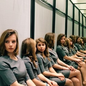 A mirror illusion posted on Facebook puzzled viewers as they tried to count how many girls were actually in the image. (Facebook/ Optical Mind) A mirror illusion posted on Facebook puzzled viewers as they tried to count how many girls were actually in the image. (Facebook/ Optical Mind)
