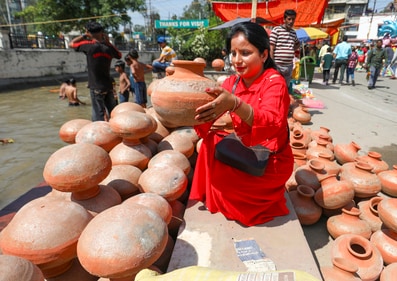 Buying earthen pots on Akshaya Tritiya symbolises grounding energy. (PTI)