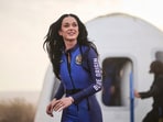 This handout photo from Blue Origin shows US singer Katy Perry upon return to Earth after a flight on Blue Origin New Shepard NS-31, which brought the passengers beyond the Karman line -- the internationally recognized boundary of space, in Van Horn, West Texas, April 14, 2025. 