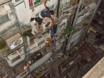Fire fighters used hydraulic ladders to rescue those who assembled in the balconies. Fire fighters used hydraulic ladders to rescue those who assembled in the balconies.