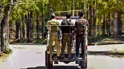 NIA personnel on their way to Baisaran from Pahalgam police station on Wednesday. (PTI) NIA personnel on their way to Baisaran from Pahalgam police station on Wednesday. (PTI)