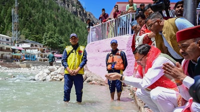 Uttarakhand Chief Minister Pushkar Singh Dhami performs a ritual during the opening of the Gangotri portal, on the occasion of Akshaya Tritiya, in Uttarkashi. (X/@pushkardhami) Uttarakhand Chief Minister Pushkar Singh Dhami performs a ritual during the opening of the Gangotri portal, on the occasion of Akshaya Tritiya, in Uttarkashi. (X/@pushkardhami)