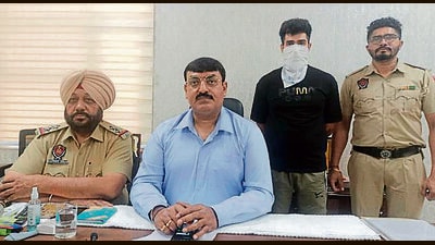 The accused in police custody in Ludhiana on Wednesday. (HT Photo)