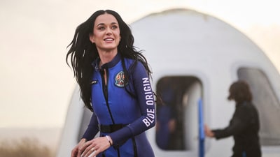 This handout photo from Blue Origin shows US singer Katy Perry upon return to Earth after a flight on Blue Origin New Shepard NS-31, which brought the passengers beyond the Karman line -- the internationally recognized boundary of space, in Van Horn, West Texas, April 14, 2025. (AFP) This handout photo from Blue Origin shows US singer Katy Perry upon return to Earth after a flight on Blue Origin New Shepard NS-31, which brought the passengers beyond the Karman line -- the internationally recognized boundary of space, in Van Horn, West Texas, April 14, 2025. (AFP)