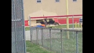 First responders work at the site of an SUV crashing into a building and killing students attending an after-school camp and injuring others in Chatham, Illinois, U.S., April 28, 2025 in this still image obtained from social media video. (Aarika Jo/TMX via REUTERS)