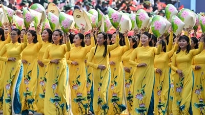 Participants march during a parade marking the 50th anniversary of the fall of Saigon and the end of the Vietnam War in Ho Chi Minh City on April 30, 2025. Vietnam held its biggest celebration of the fall of Saigon on its 50th anniversary on April 30, including Chinese troops for the first time after Xi Jinping visited to portray Beijing as a more reliable partner than Washington. (Photo by NHAC NGUYEN / AFP) (AFP) Participants march during a parade marking the 50th anniversary of the fall of Saigon and the end of the Vietnam War in Ho Chi Minh City on April 30, 2025. Vietnam held its biggest celebration of the fall of Saigon on its 50th anniversary on April 30, including Chinese troops for the first time after Xi Jinping visited to portray Beijing as a more reliable partner than Washington. (Photo by NHAC NGUYEN / AFP) (AFP)