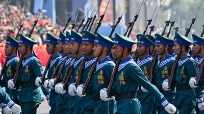 Members of the Vietnamese armed forces march during a parade marking the 50th anniversary of the fall of Saigon and the end of the Vietnam War in Ho Chi Minh City on April 30, 2025. Vietnam held its biggest celebration of the fall of Saigon on its 50th anniversary on April 30, including Chinese troops for the first time after Xi Jinping visited to portray Beijing as a more reliable partner than Washington. (Photo by NHAC NGUYEN / AFP) (AFP) Members of the Vietnamese armed forces march during a parade marking the 50th anniversary of the fall of Saigon and the end of the Vietnam War in Ho Chi Minh City on April 30, 2025. Vietnam held its biggest celebration of the fall of Saigon on its 50th anniversary on April 30, including Chinese troops for the first time after Xi Jinping visited to portray Beijing as a more reliable partner than Washington. (Photo by NHAC NGUYEN / AFP) (AFP)
